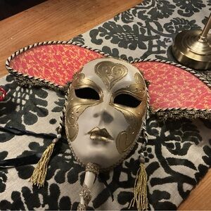 Elegant Gold and Red Venetian Mask